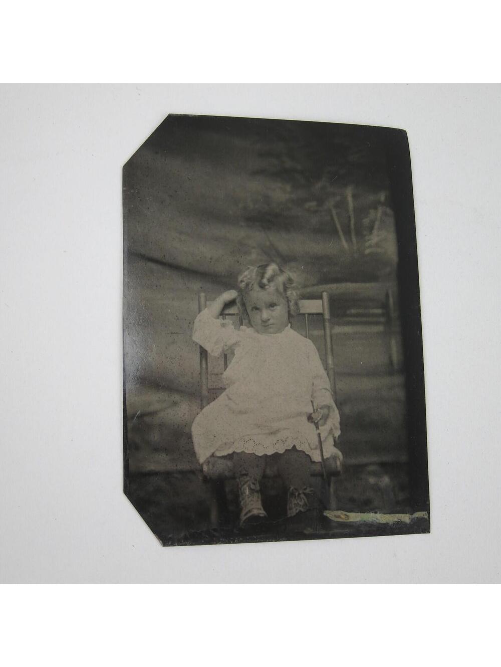 Tintype Photo Young Child Blonde Curls Sits in Chair Pouting Face Antique